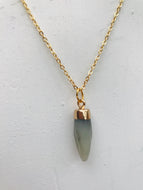 Glass horn charm necklace