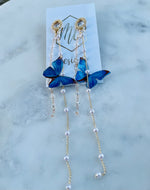 Long dainty blue butterfly earrings