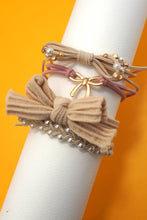 FUN DUAL FUNCTION KNOT BRACELET HAIR TIES
