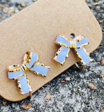 White Clip On Bow Earrings