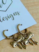 Small Bow Huggies Hoop Earrings