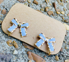White Clip On Bow Earrings