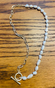 Gold and pearl necklace with toggle clasp