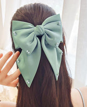 Hair Bow Clip Adorned with Pearl Accents