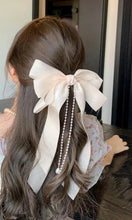 Elegant Pearl Accented Cream Chiffon Bow