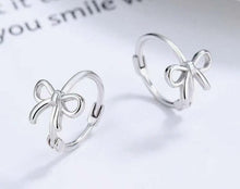 Small Bow Huggies Hoop Earrings