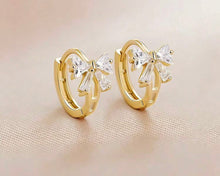 Small Bow Huggies Hoop Earrings