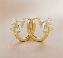Small Bow Huggies Hoop Earrings