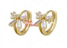 Small Bow Huggies Hoop Earrings