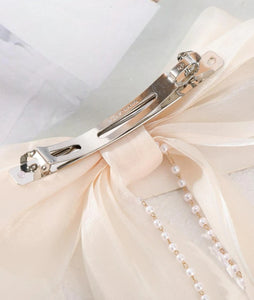 Elegant Pearl Accented Cream Chiffon Bow