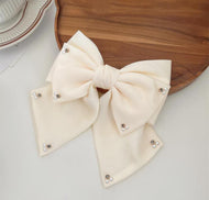 Hair Bow Clip Adorned with Pearl Accents