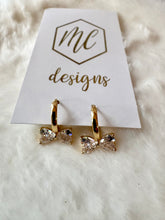 Small Bow Huggies Hoop Earrings
