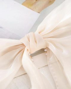 Elegant Pearl Accented Cream Chiffon Bow