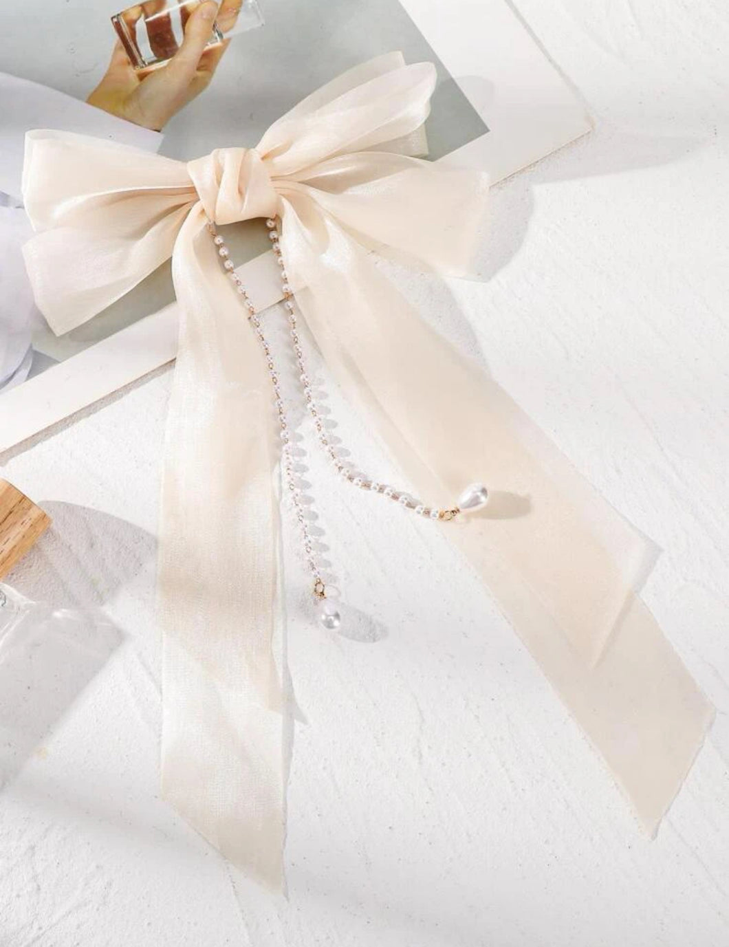 Elegant Pearl Accented Cream Chiffon Bow