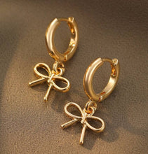 Small Bow Huggies Hoop Earrings