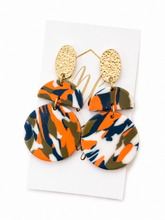 Triple bright orange/white/blue clay earrings