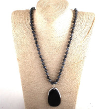 Lava bead necklace with stone pendant