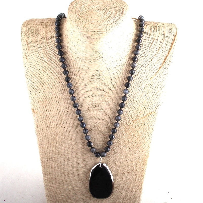Lava bead necklace with stone pendant