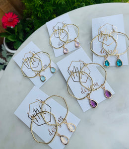 Gold circle earrings with colorful teardrops