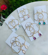 Gold circle earrings with colorful teardrops