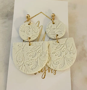 Imprinted flower tiered clay earrings