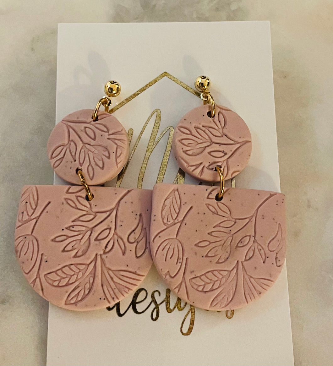 Imprinted flower tiered clay earrings