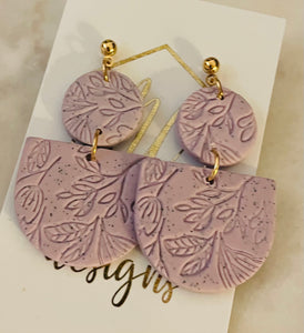 Imprinted flower tiered clay earrings