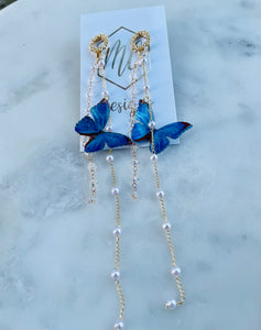 Long dainty blue butterfly earrings