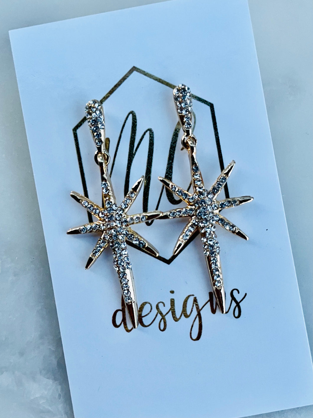 Elongated rhinestone starburst earrings