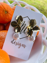 Gold bent flower with pearl drop earrings