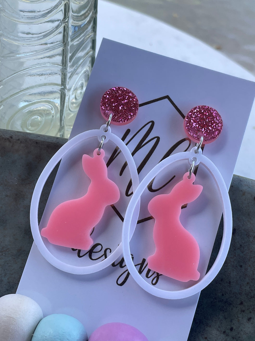 White hollow egg with pink bunnies