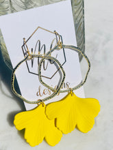 Gold circle earrings with colorful ginkgo leaves