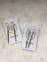 Long spiky earring