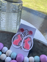 White hollow egg with pink bunnies