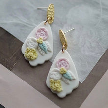 White clay floral earrings