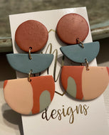 Clay polymer earrings with circle and half moons